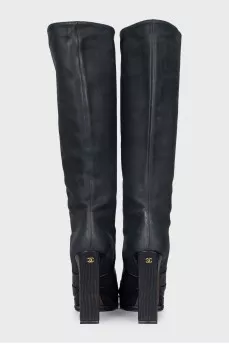 Leather boots with a relief pattern
