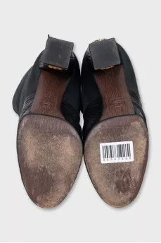 Leather boots with a relief pattern