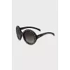 Sunglasses decorated with spikes