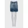 Denim mini skirt with buttons and decoration