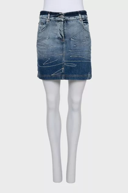 Denim mini skirt with buttons and decoration