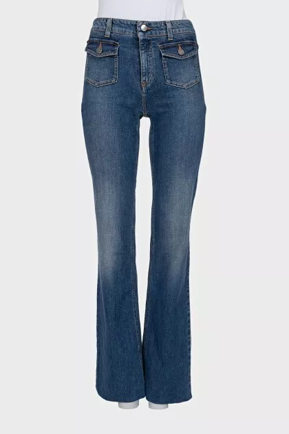 Сині джинси з накладними кишенями