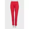 Red trousers with creases