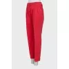 Red trousers with creases