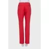 Red trousers with creases