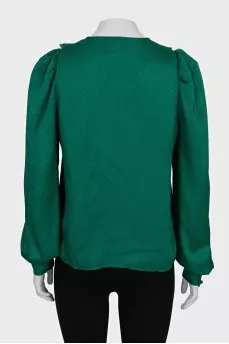 Long sleeve blouse decorated with ruffles