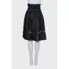 Black skirt with a wide belt