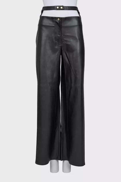 Faux leather trousers with a cutout