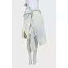 Asymmetrical denim skirt with buttons