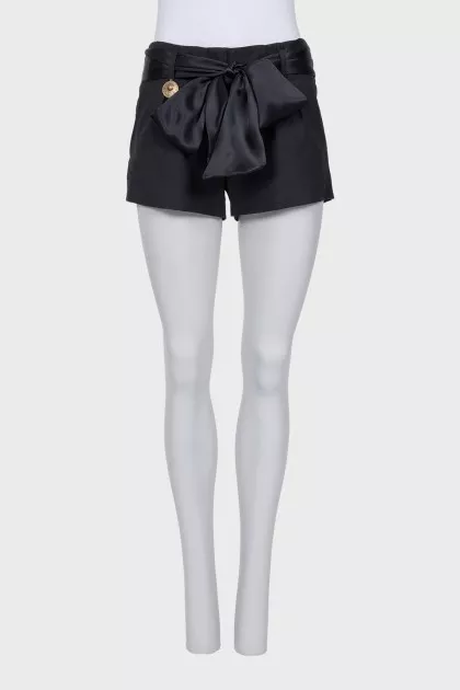 Short shorts with a silk belt