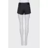 Short shorts with a silk belt