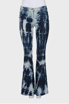 Tie-dye flared jeans