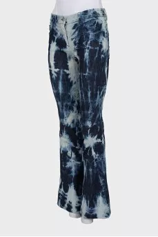 Tie-dye flared jeans