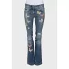 Flared jeans with embroidery and beads