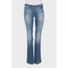 Flared jeans with rhinestones