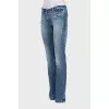 Flared jeans with rhinestones
