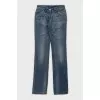 Low-rise straight leg jeans with distressing