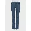 Flared jeans with embroidered logo