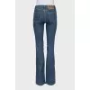 Flared jeans with embroidered logo
