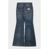 Flared jeans with a distressed effect