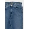 Mid-rise distressed jeans