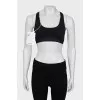 Black sports top with tag