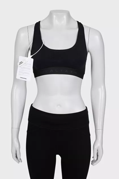 Black sports top with tag