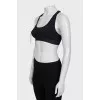 Black sports top with tag