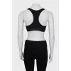 Black sports top with tag