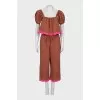 A ruffled cropped pants and top suit