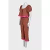 A ruffled cropped pants and top suit