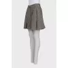 Button-down skirt with tag