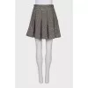 Button-down skirt with tag