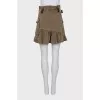 Skirt with a frill decorated with an eyelet