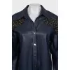 Blue eco-leather shirt with tag