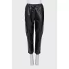 Black eco-leather trousers