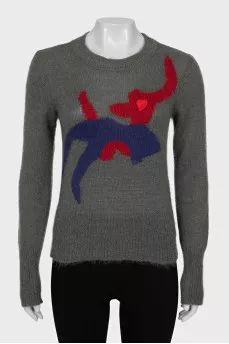 Green sweater with embroidery