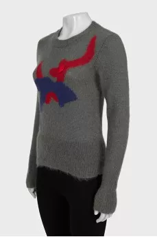 Green sweater with embroidery