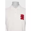 Men's polo shirt with a patch
