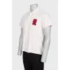 Men's polo shirt with a patch