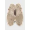 Suede slip-ons with gold decor