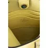 Yellow leather bag with studs