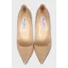 Beige textured leather pumps