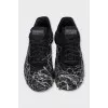 Men's sneakers made of textile and leather with a print