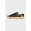 Textile sneakers with a military print