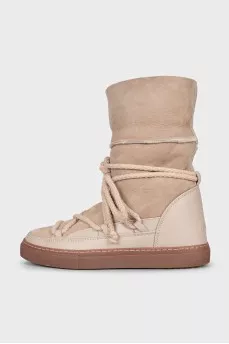 Suede boots with decorative laces