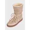 Suede boots with decorative laces