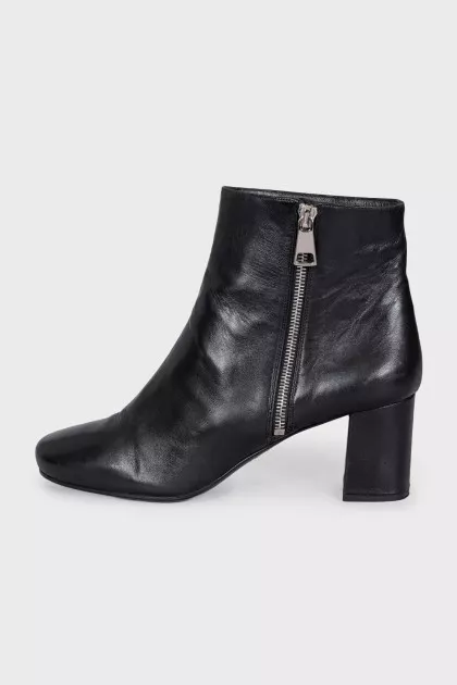 Black ankle boots with a trapezoid heel