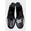 Black ankle boots with a trapezoid heel
