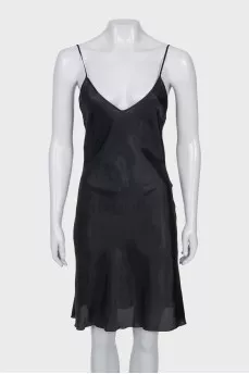 A fitted dress with thin straps